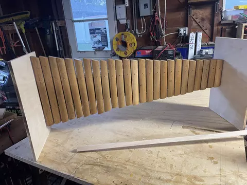 Vertical xylophone bars on a frame