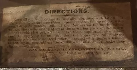 The directions label inside the orguinette