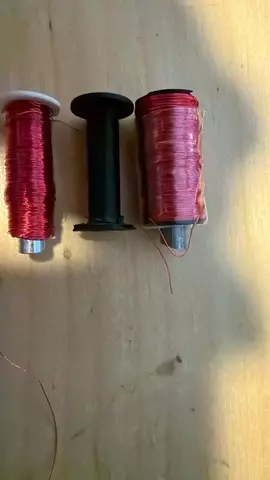 Three spools with magnet wire