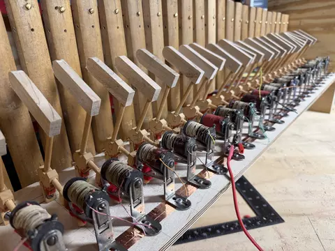 the inside action of the lignoutron including the hammers, actuators, and tone bars
