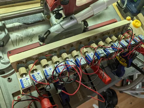 12 solenoid valves on a rail