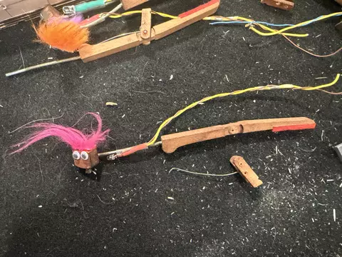 Striker assembly with flange detached 