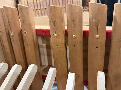 Xylophone bars with screws holding them