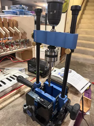 Hand drill with drill guide