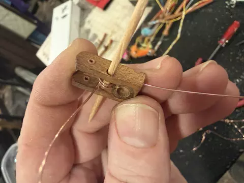 Wooden flange with spring