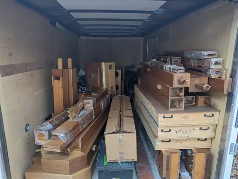 Organ pipes and boxes in a trailer