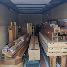 Organ pipes and boxes in a trailer