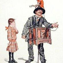 An organ grinder with a monkey